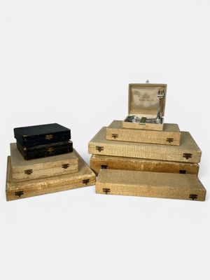 three boxes that are stacked on top of each other