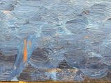 an oil painting of a boat in the ocean with waves on it
