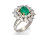 an emerald and diamond ring