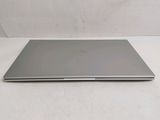 an apple macbook air laptop computer sitting on top of a white table
