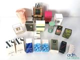 a lot of different types of perfumes on the table