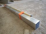 a metal beam that is laying on the ground