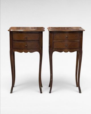 pair of french bedside tables with marble top