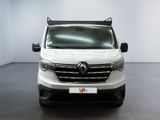 the front view of a white van parked in a room