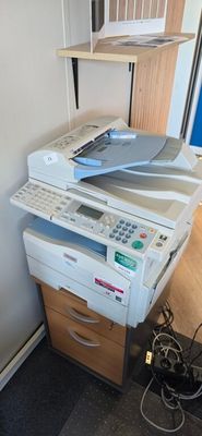 a printer that is sitting on top of a desk