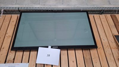 a picture of a glass window on a wooden floor