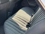 the back seats of a car are empty with no one in it