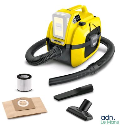 yellow and black vacuum cleaner with cleaning kit and accessories on a white background