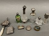 a lot of silver objects that are on a table