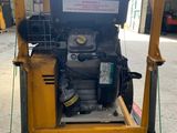 a machine that is sitting on a pallet in a warehouse