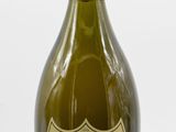 a bottle of wine that is sitting on a table