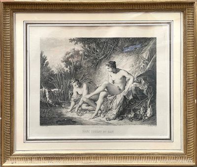 une vieille photo représentant une femme nue dans un décor boisé
