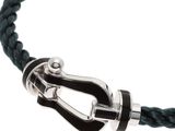 black leather bracelet with a silver clasp on a white background