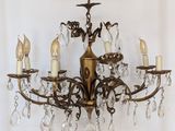 an image of a chandelier hanging from a ceiling with five lights