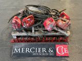 un tas de matériel de soudure posé sur une palette dans un entrepôt