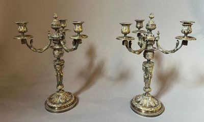 pair of antique brass candelabs with candlesticks on stands