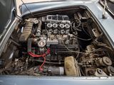 a car with a engine in the trunk of it
