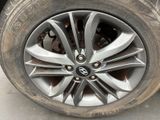 a close up of a tire on a car