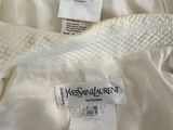the label on a white dress shows the size of the dress