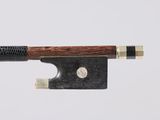 a close up of a violin bow on a white background