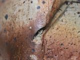 a close up of a piece of bread on a table