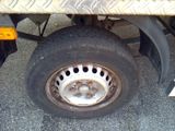 a close up of a tire on a truck