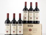 six bottles of red wine in a cardboard box on a table