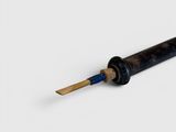 a black pipe with a wooden handle on a white surface