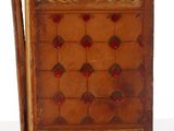 an old book with a wooden cover sitting on top of a table