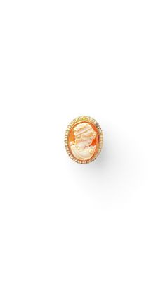 an orange and white diamond ring on a white background