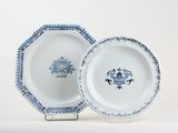 two plates with blue and white designs on them