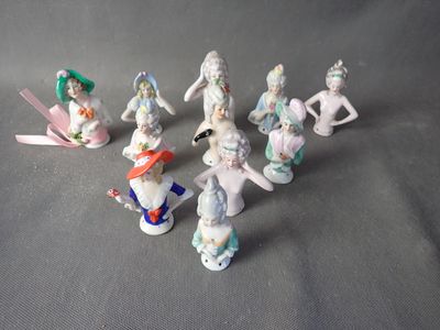 many figurines that are sitting on a table