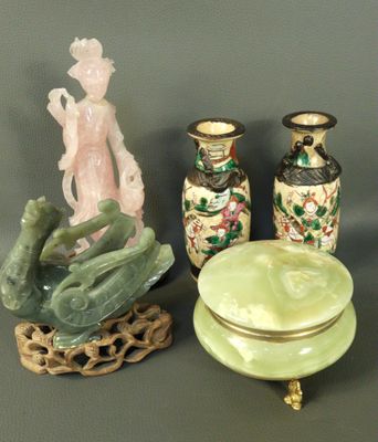 three vases that are sitting next to each other on a table