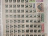 a picture of a sheet of stamps on a table