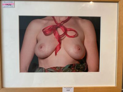 a picture of a woman with a red ribbon on her chest