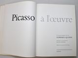an open book that has a picture of a person on it