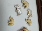 a picture of a collection of small figurines on a table