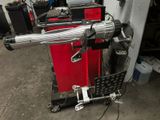 an image of a motorcycle being worked on in a garage