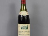 a bottle of wine that is sitting on a table