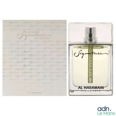 une photo d'un flacon de parfum à côté d'une lettre manuscrite
