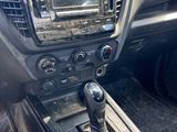 a dashboard of a car with a radio in it