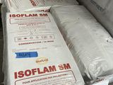 two mattresses in the back of a truck that is being loaded