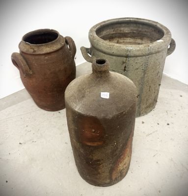 three vases sitting next to each other on a table