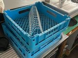 a blue basket that is sitting on top of a counter