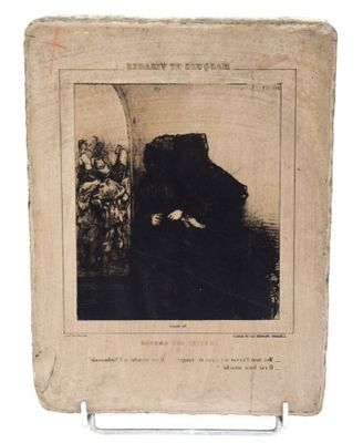 une vieille photo d'un homme assis sur une chaise, coiffé d'un chapeau