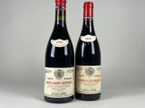 deux bouteilles de vin rouge posées l'une à côté de l'autre sur une table
