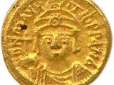 une pièce d'or portant l'image d'un homme