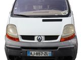 a white van that is parked on the side of the road