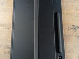 a black case that is open on a wooden table