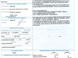 a close up of a document with a barcode on it